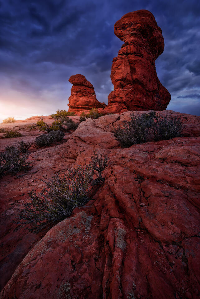 Rock formations in the Garden of Eden section of Utah's Arches National Park pick up the faint, post-sunset light on a moody spring evening.