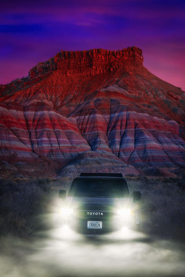 Beautiful badlands, a colorful sunset, and the thrill of exploring dusty trails a Land Cruiser on an evening in Utah.