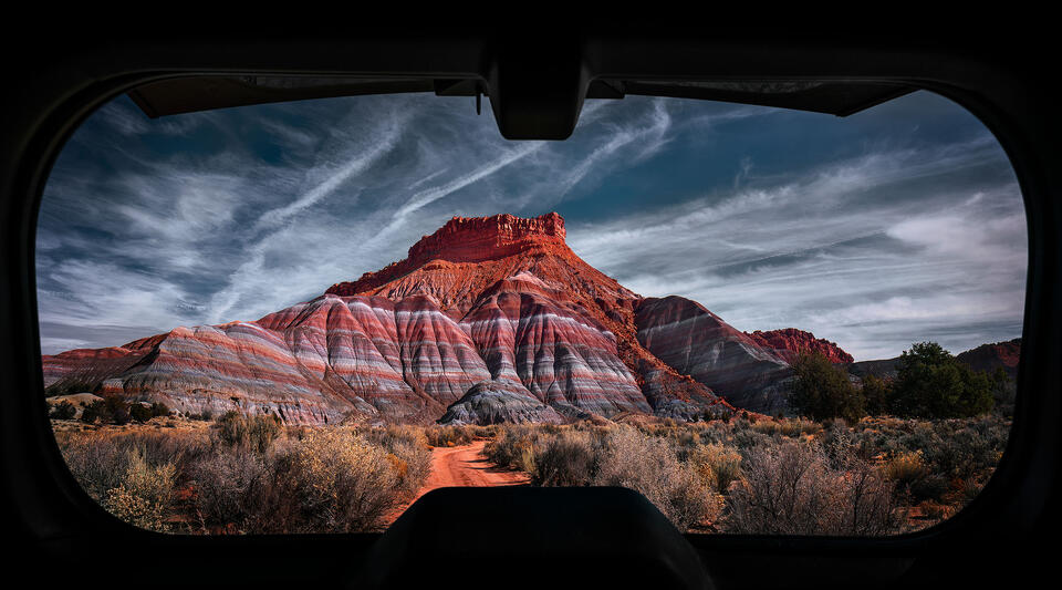 The view out of the back hatch of my Land Cruiser from my campsite near the Paria Badlands in Southern Utah.