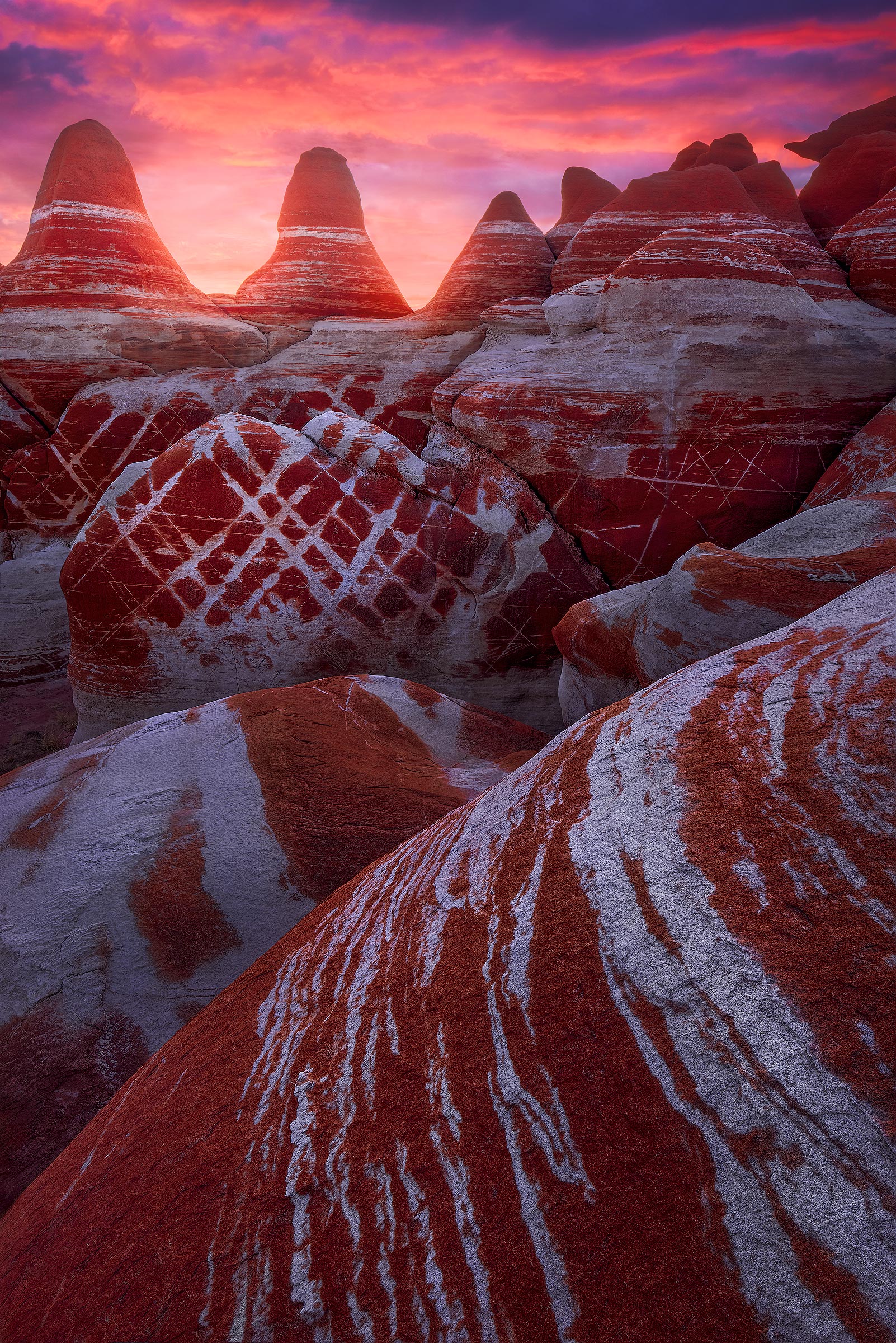 Creation A beautiful sunset lights up a fantasyland of striped stone in Hopi Lands, Arizona.