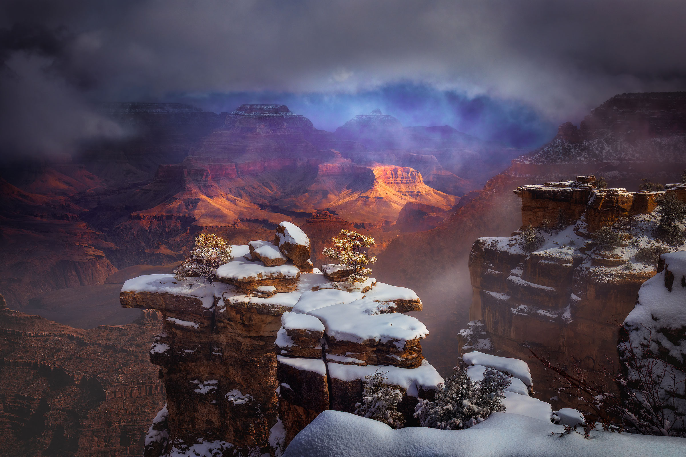 Reverence A winter storm clears and reveals canyons far below a snowy promontory near Mather point.